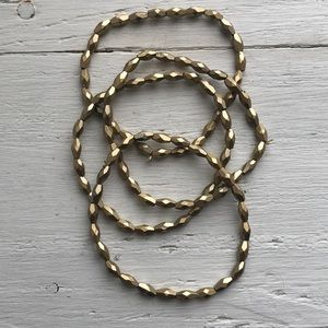 Set of 4 gold beaded bracelets